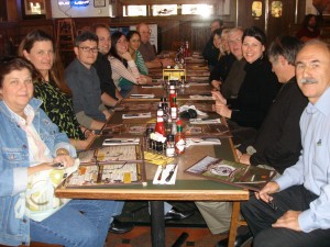 Mosaic staff congratulate Dan Kelly, third from left, on earning his architectural license