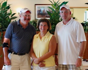 Theresa Moroukian teams up with David Boyce, Ralf Sosnowski and Curt Benedetto (not pictured) at the Patriot Hills of NY Annual Golf Tournament