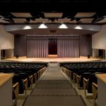 A ramp and four ADA-designated seating areas at the front and back of the house improved accessibility in Mosaic's theater design at Amsterdam High School.