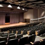 Comfortable, durable seating replaced outdated and damaged seating in Mosaic's theater design at Amsterdam High School.