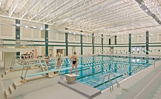 A separate deep-end space in the aquatic center Mosaic designed for Shenendehowa High School has four competitive diving boards. Bleachers accommodate 500 spectators.
