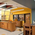 Mosaic’s design solution for the library renovation was to enclose the central area and redefine it as a Library Media Center illumined by day with expansive skylights.