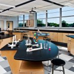 Mosaic Associates used of “teaching walls” in the Glens Falls High School science wing to define laboratory and instructional spaces in the long classrooms, while larger tables are designed to serve as both lab tables and student desks.