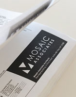 Mosaic Associates logo shown on an architectural blueprint.