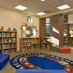 Colorful reading room featured in the Shatekon Elementary School design by Mosaic Associates Architects.